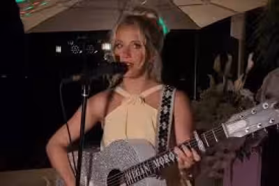 Megan Moroney Shares Beachside Bridesmaid Photos, Says She's Focused on Music