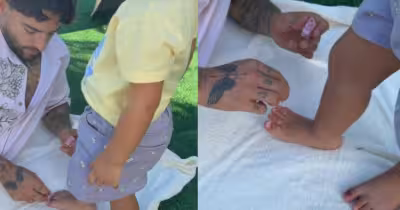 Maluma paints toddler París’s toenails in viral family video that ends with a kiss
