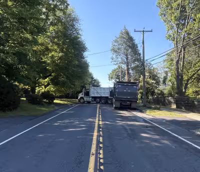 School Bus, two dump trucks crash closes North Main Street in West Hartford