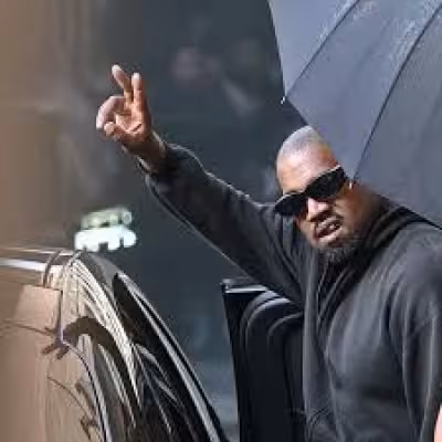 Kanye West and Bianca Censori Hold Hands in Amsterdam as Censori Debuts Satin Dress