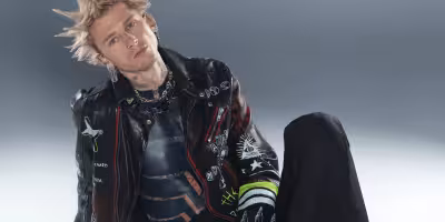 Mgk completes two-month blackout tattoos and drops Blog Era Boyz mixtape