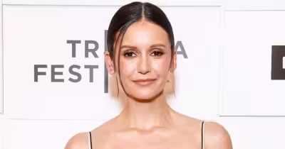 Nina Dobrev in Adam Lippes satin slip at Tribeca, shares Carrie Bradshaw nod