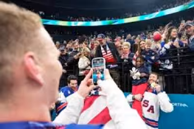 Jaccob Slavin hugged Seth Jarvis a day after walking into Carolina wearing his Olympic gold