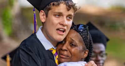 Wheeler School Viral Photo captures a graduation hug between senior and staffer
