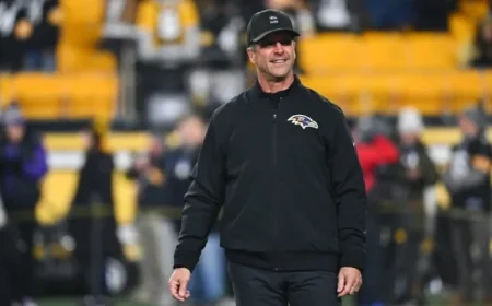 John Harbaugh Sparks Rumors with Giants Visit: Connections to Falcons, Titans Explored
