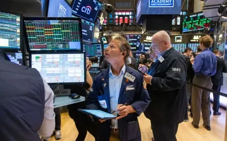 Stock futures slide ahead of Tuesday open as tariff threats rattle risk appetite and lift safe havens