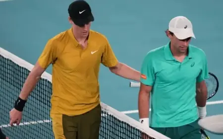 Sinner Battles Cramps, Heat to Defend Australian Open; Djokovic Secures 400th Win