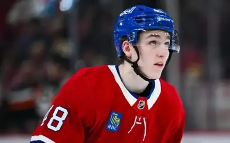 Bruins Coach Urges Team to Approach Lane Hutson as Cale Makar