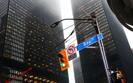 TSX Rises as S&P 500 Falls; Central Banks Hold Interest Rates Steady