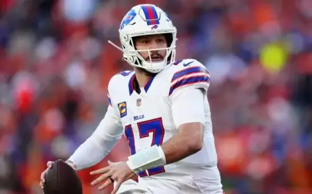 Josh Allen Appears on Crutches at Joe Brady’s Press Conference