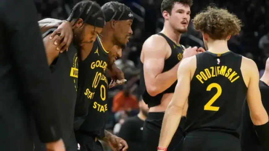 Warriors’ Jimmy Butler Exits Game with Knee Injury Against Heat