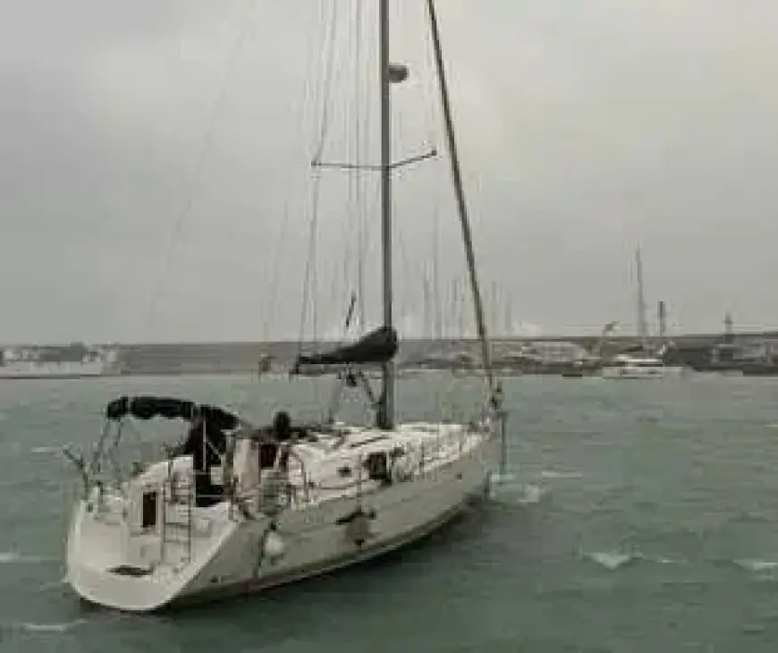 Father and Son Rescued After Struggling to Secure Drifting Boat