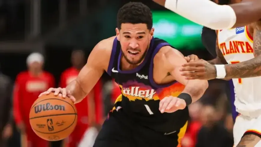Devin Booker Exits Game with Right Ankle Injury After Teammate Falls