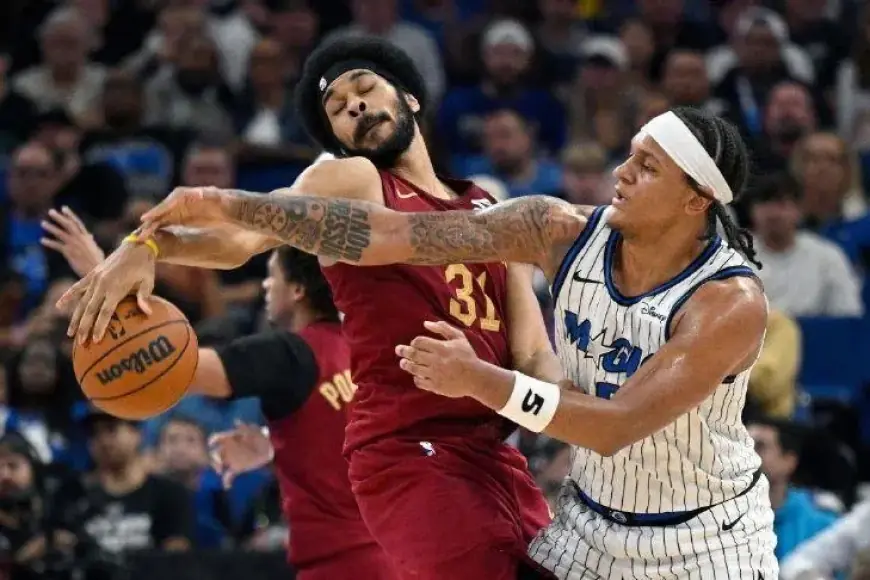 Cavaliers’ Jarrett Allen Fouls Magic’s Paolo Banchero in Second Half Clash