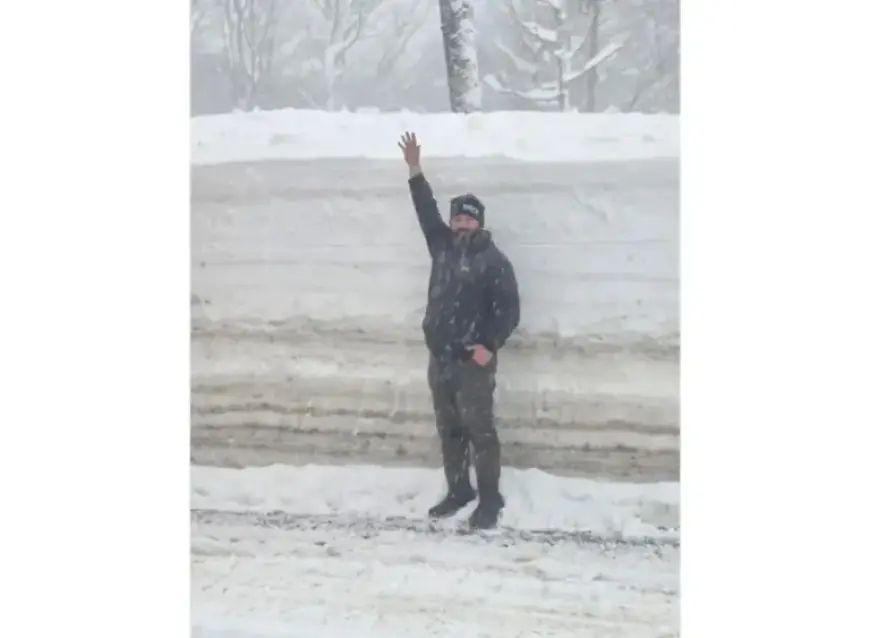 State DOT Worker and 8-Foot Snowbank Photo Go Viral