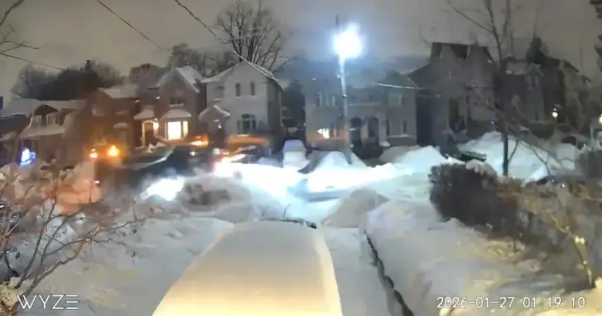 Camera Captures Snowplow Striking Parked Car in Bedford Park