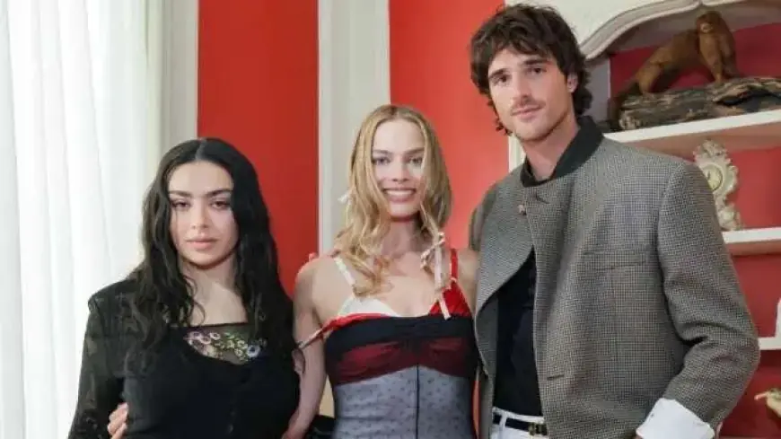 Margot Robbie Stuns in Markgong Sheer Illusion Dress with Layered Bras