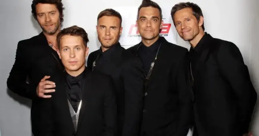 Take That Hail Robbie Williams’ Record; Gary Barlow Hints at Reunion