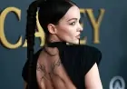 Dove Cameron Flaunts Tattoos in Black Dress at MusiCares Event