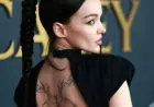Dove Cameron Showcases Tattoos in Elegant Black Dress at MusiCares Event