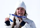 Breezy Johnson wins Olympic downhill gold as Cortina race turns chaotic