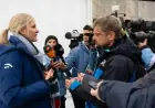 IOC President Kirsty Coventry Discusses With Ukrainian Skeleton Pilot Vladyslav Heraskevych