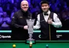 Snooker: Zhao Xintong beats John Higgins to win Players Championship