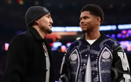 Boxing Star Shocks with Low Blow to World Champ at Fiery Conference