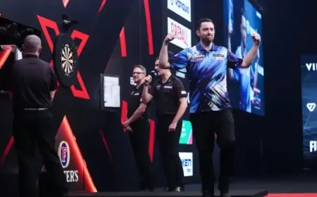 Humphries Triumphs in Thrilling Nine-Dart Showdown with Woodhouse