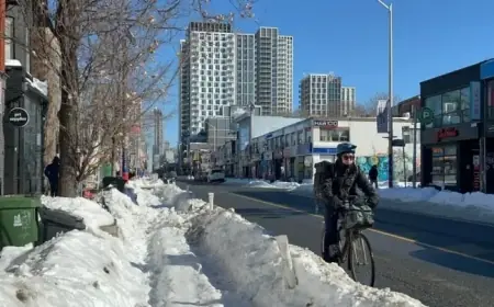 Toronto Cyclists Confront Snow-Blocked Lanes After Record Storm