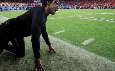 Michael Irvin Dines in Dallas with Brian Schottenheimer