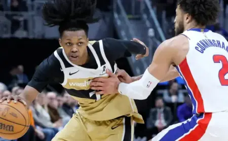 Riley and Cooper Propel Undermanned Wizards to Victory Over Pistons