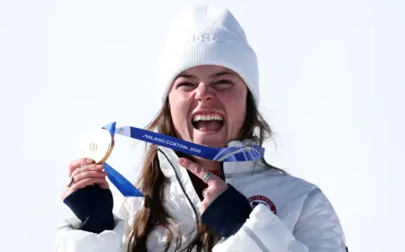Breezy Johnson wins Olympic downhill gold as Cortina race turns chaotic