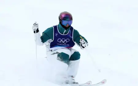Graham Advances to Moguls Final After Narrow Escape