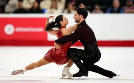 Deanna Stellato-Dudek, Maxime Deschamps Compete in Winter Olympics Pairs Event