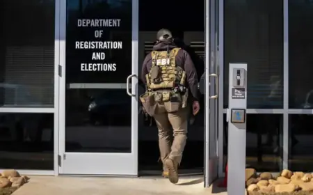 Conservative Researcher Tied to FBI’s Georgia Election Records Seizure