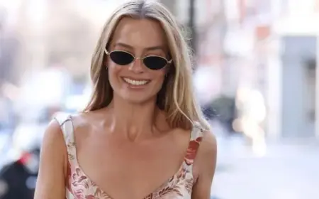 Margot Robbie Shines in Sheer Fishnet Minidress at Premiere