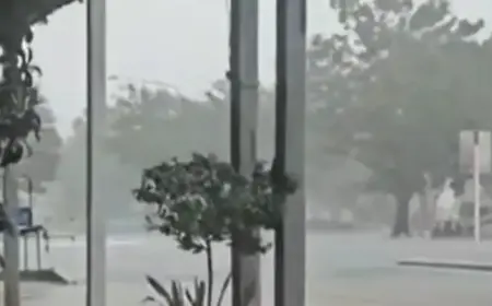 Queensland Floods: Woman and Rescuers Saved from Raging Waters