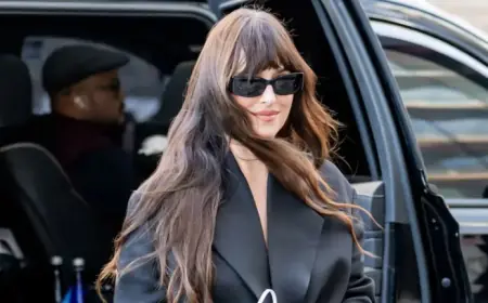 Dakota Johnson Dazzles in Calvin Klein with $46K Jewels and Aquazzura Boots