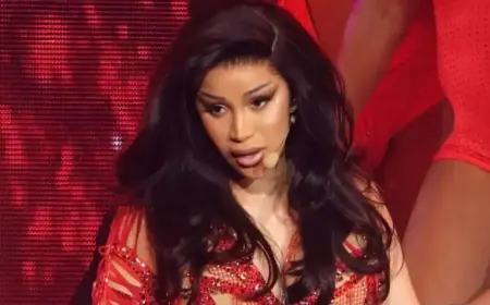 Cardi B Jokingly Blames Government After Falling Off Chair at Concert