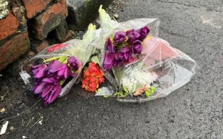 Floral tributes and heavy cordon in horden as CSI examines alleyway