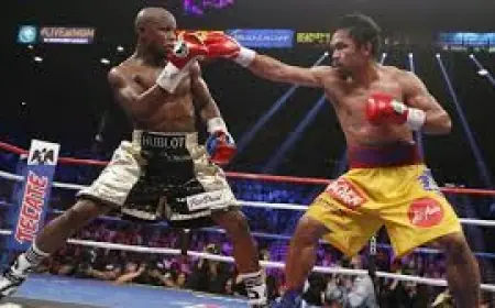 Manny Pacquiao and Floyd Mayweather set for 'carnival' rematch in Las Vegas