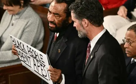 Rep. Al Green Ejected From State of the Union After Holding "Black People Aren't Apes" Sign at Trump's Address