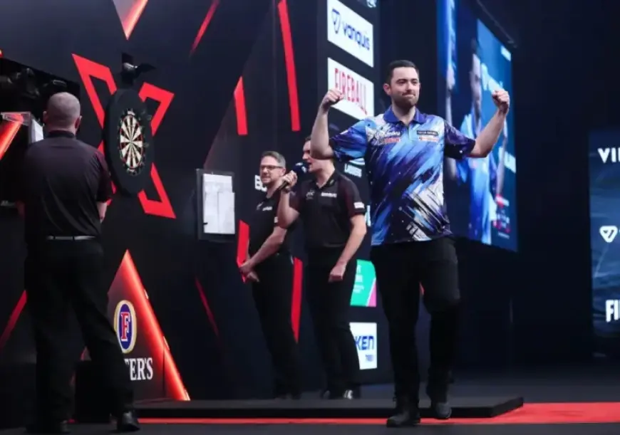 Humphries Triumphs in Thrilling Nine-Dart Showdown with Woodhouse