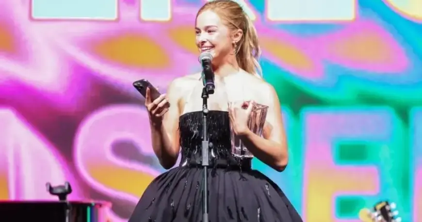 Addison Rae Shines in Sequin Minidress with Unique Apron Design