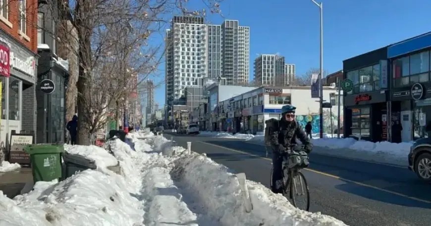 Toronto Cyclists Confront Snow-Blocked Lanes After Record Storm