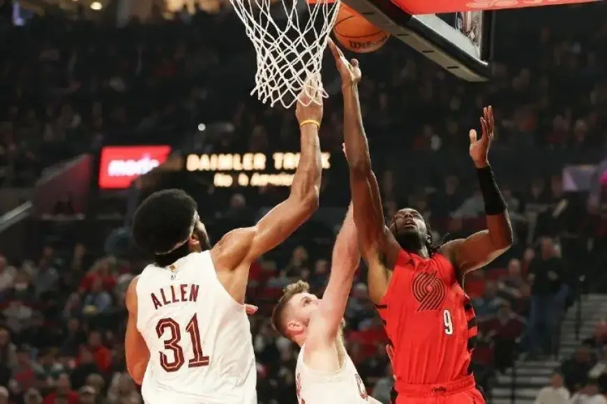 Jerami Grant Drives Past Cavaliers’ Defense in Trail Blazers Game
