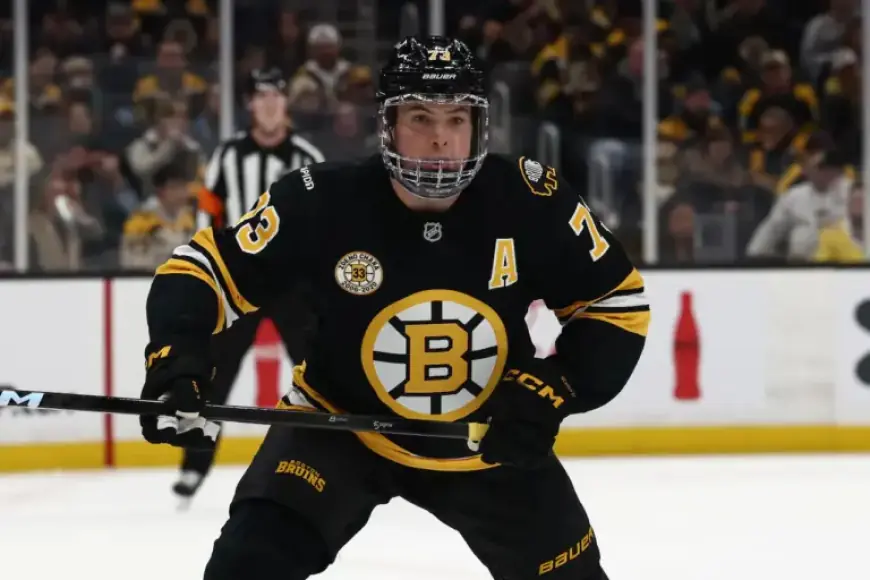 Bruins Defenseman Exits Ice Injured After Head Elbow Incident