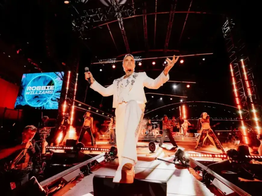 Robbie Williams’ 90’s Tour Takes Wolverhampton: Tickets, Schedule, and Setlist Details