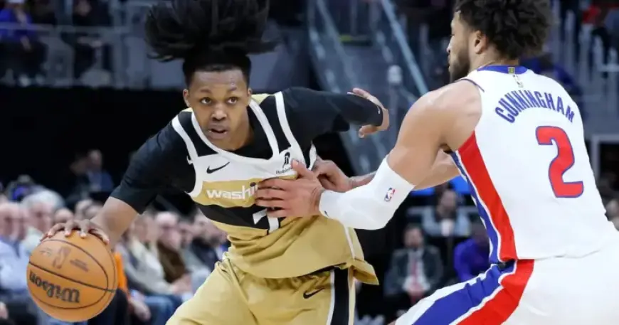 Riley and Cooper Propel Undermanned Wizards to Victory Over Pistons